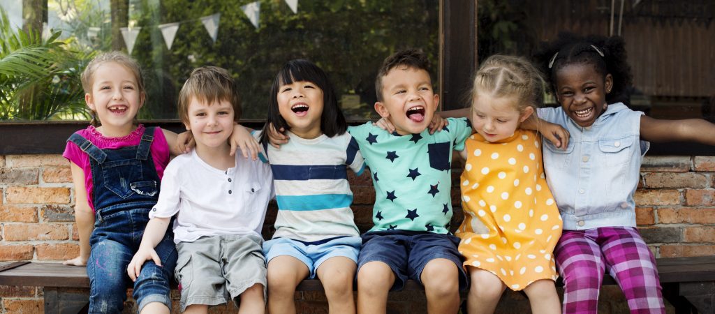 Kindergarten kids on bench