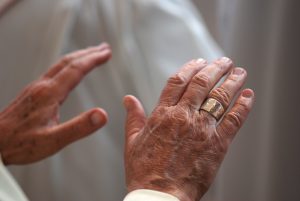 Hands of a Priest Praying