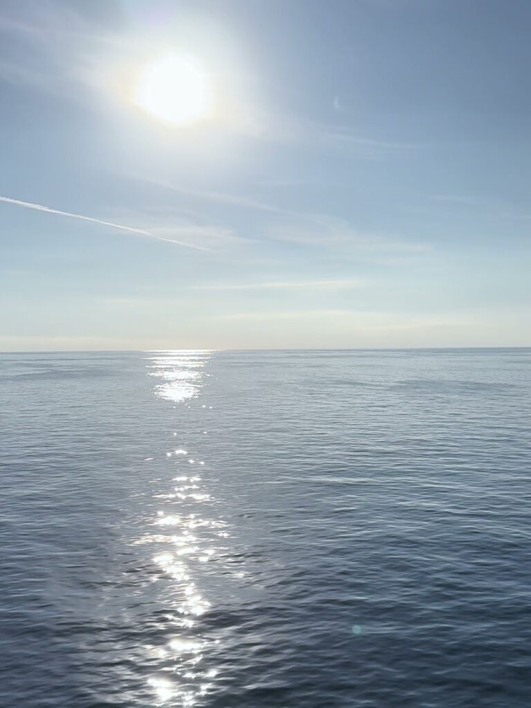 Sunlight glittering on the open sea
