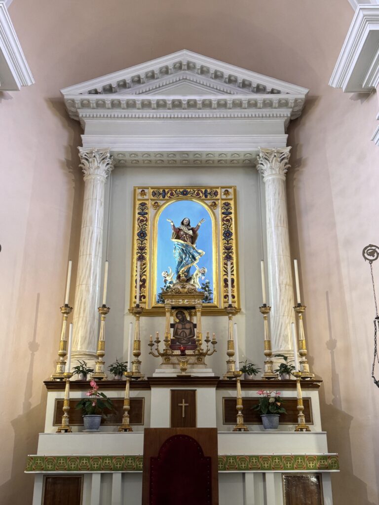 White marble altar with a statue of Mary in the Catholic church in Chania