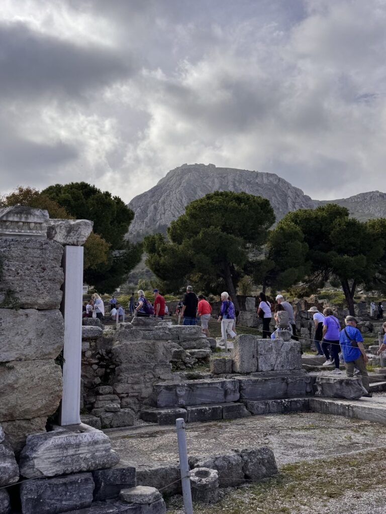Acrocorinth rising above the ruins of ancient Corinth