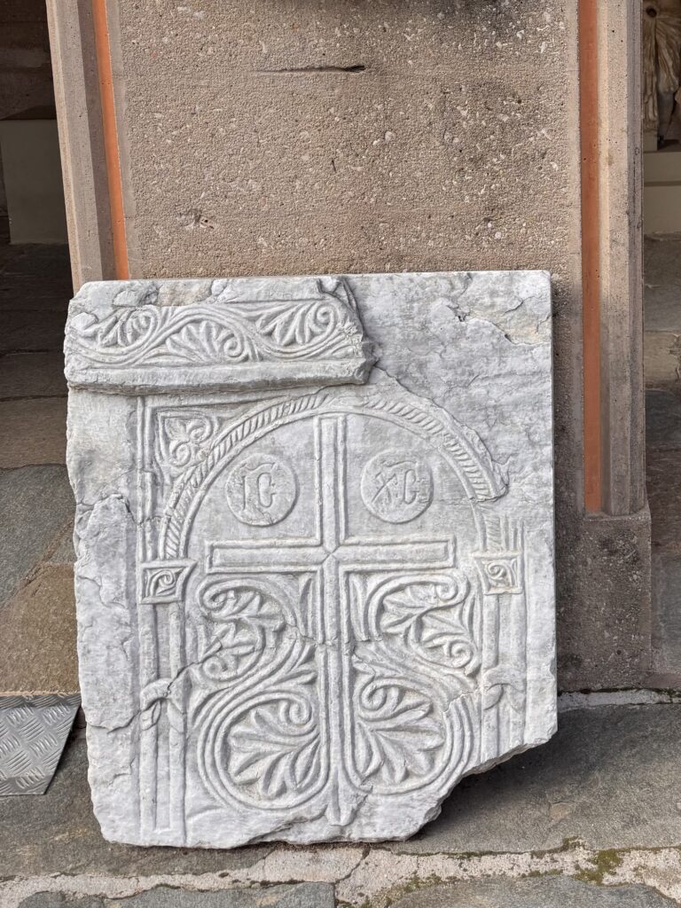 Marble slab carved with a cross and the letters IC XC at the Corinth museum