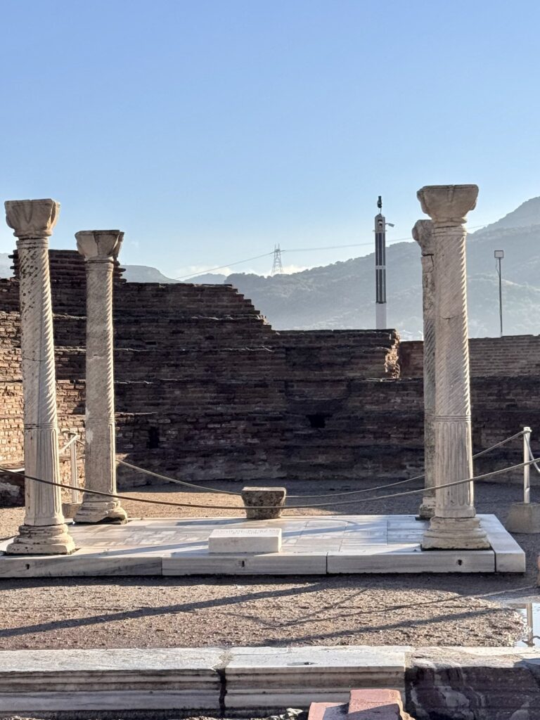 The marble platform over the tomb of St. John, framed by four columns