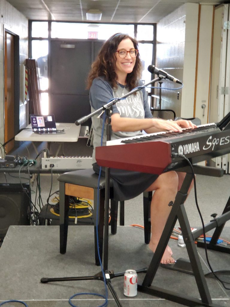 Sarah Hart performing at Daughters of God Retreat