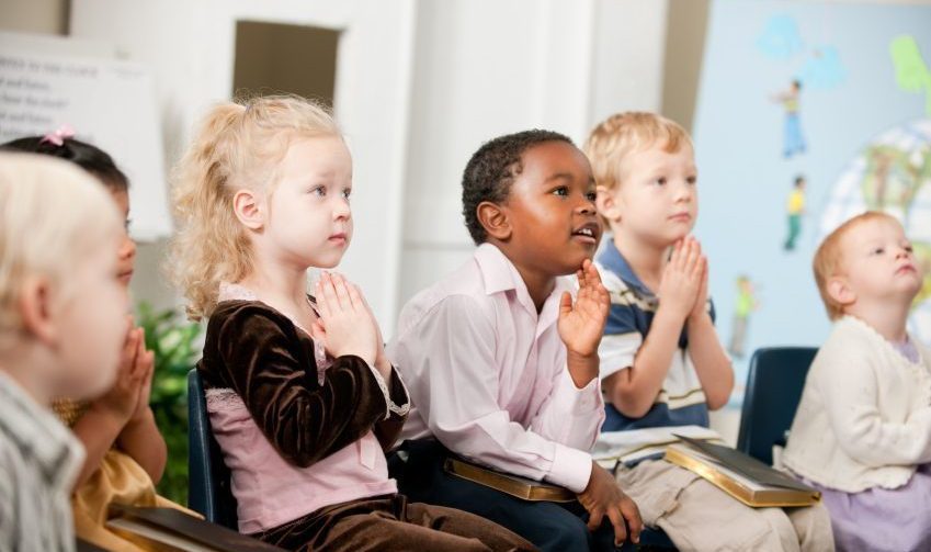 A group of multi-ethnic children at Sunday School