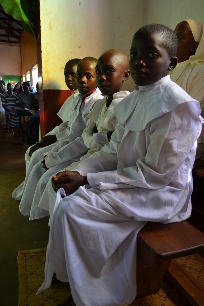 boys wearing white robes