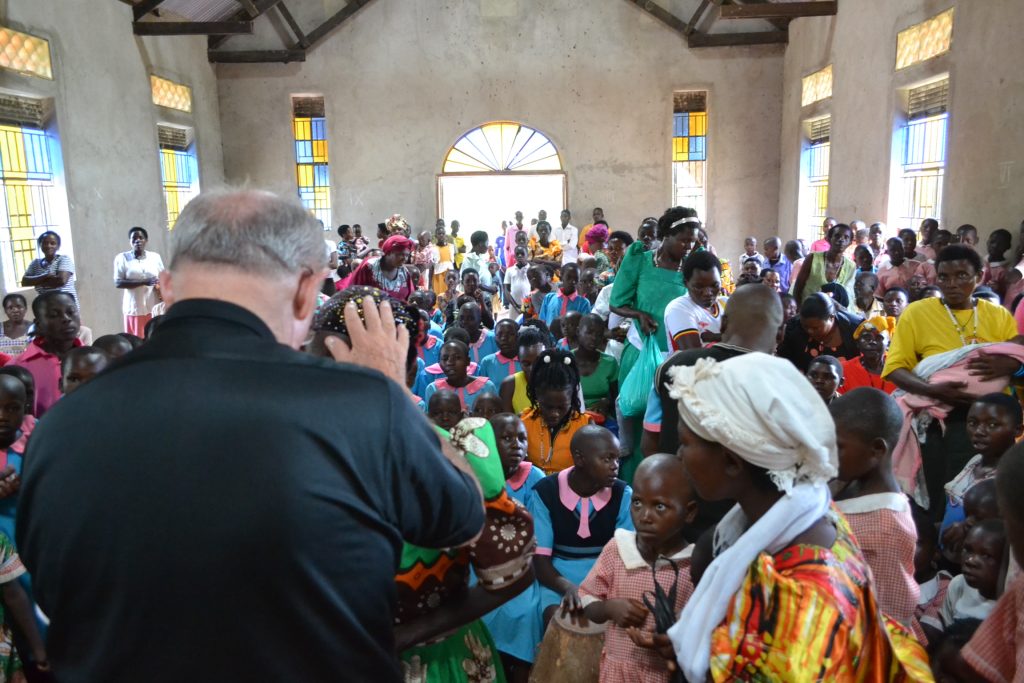 priest blessed woman inside church