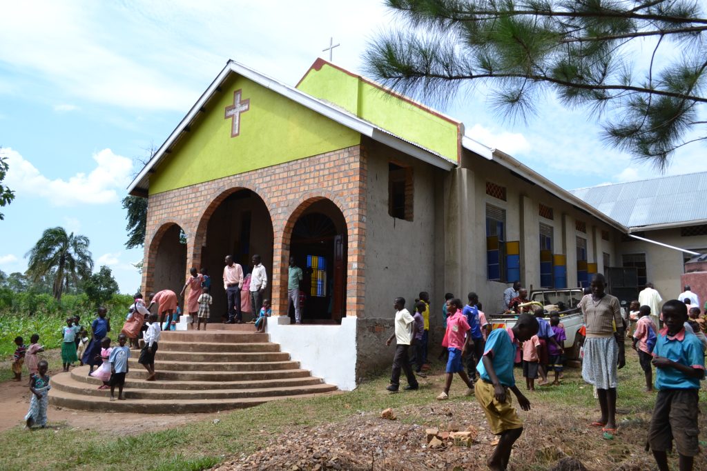 brick church with arches over porch