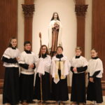 Children participating in mass service photo