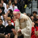 Bishop John Noonan with group of children image