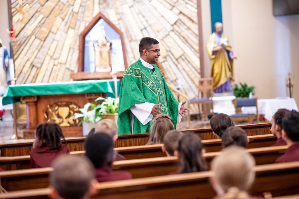 Father Derek Saldanha at Mass