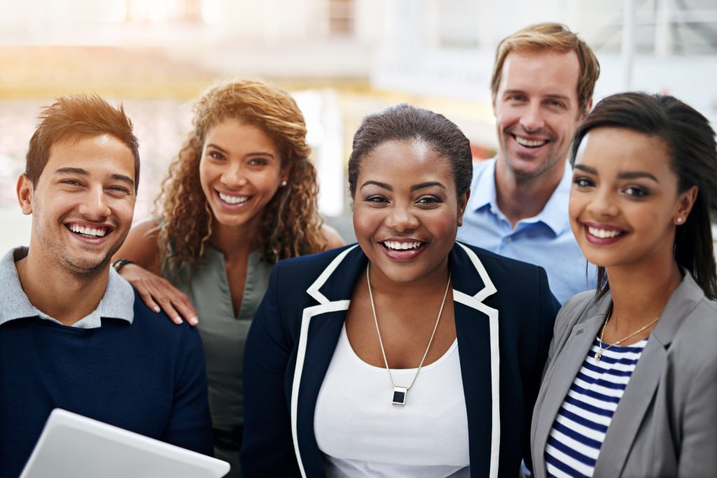 http://Portrait%20of%20a%20group%20of%20smiling%20coworkers