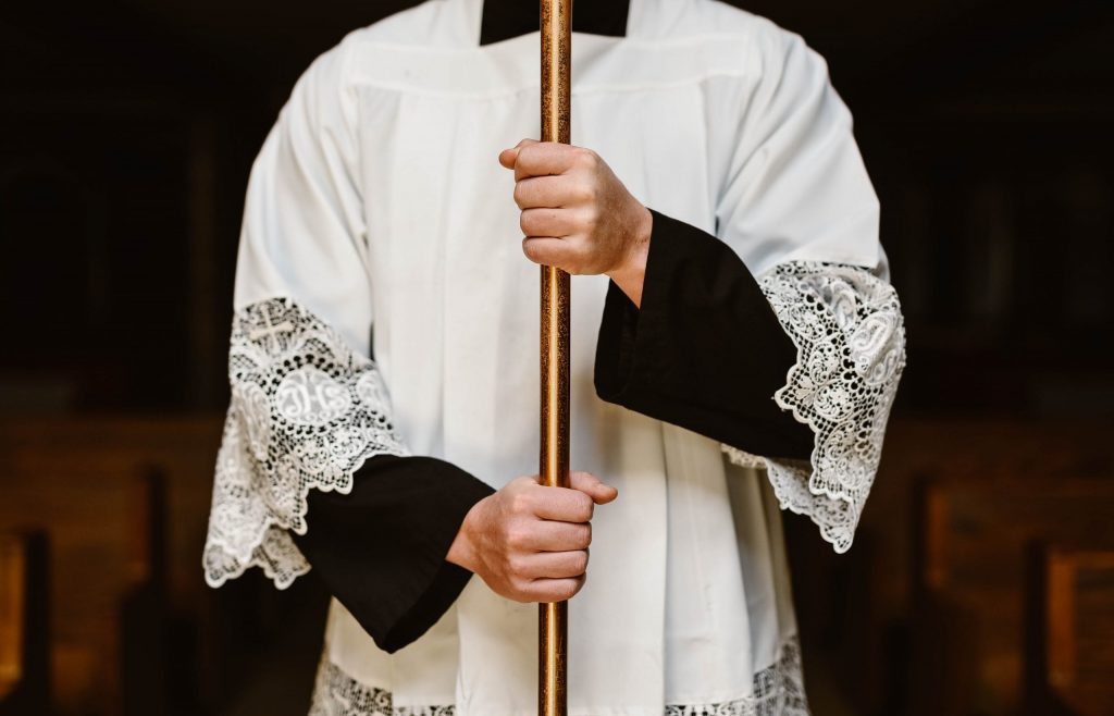Altar Server holding Cross