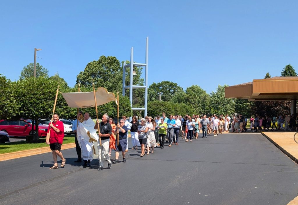 Eucharistic Procession on the Feast of Corpus Christi at Our Lady of the Lake Catholic Church in Holland Michigan.