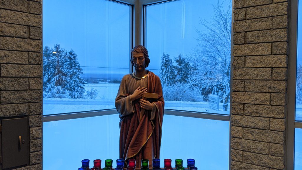 Statue of St. Joseph in winter