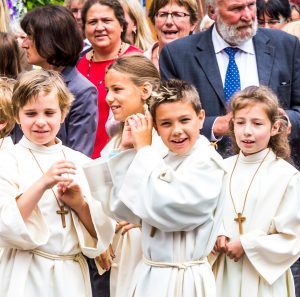 children in altar server garments