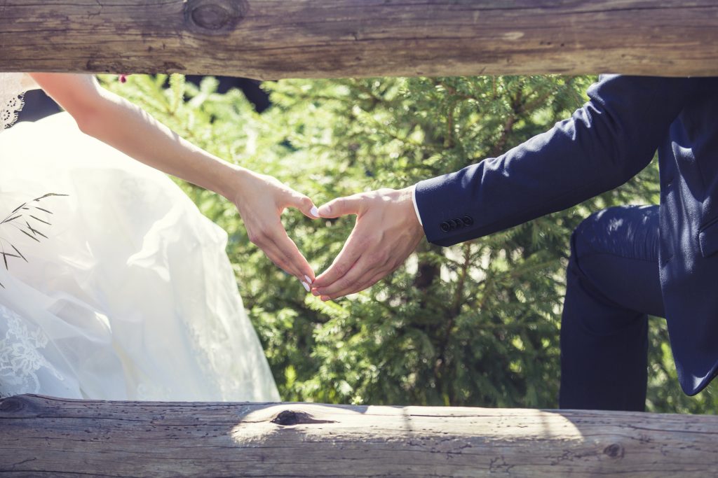 Man and woman couple holding hands