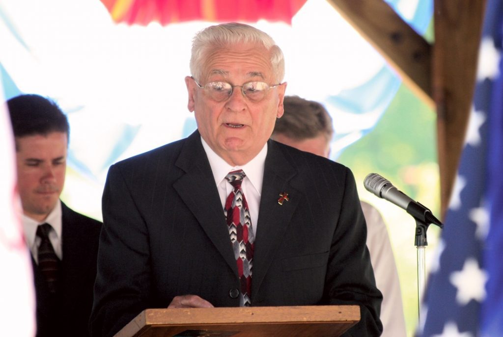 Deacon Romolo Leone speaks at the Dexter Memorial Day commemoration.