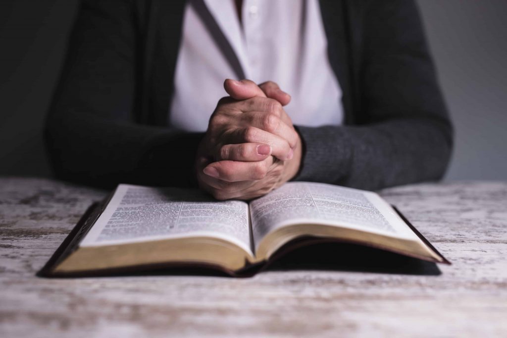 http://Close%20up%20of%20woman%20reading%20holy%20bible