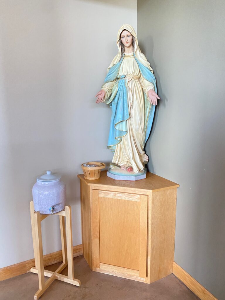 Virgin Mary Statue with holy water