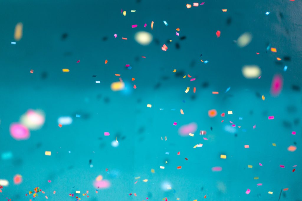 Confetti over blue background