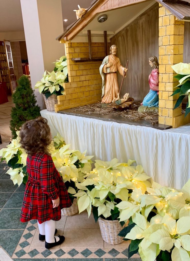 Annie at the manger Child at manger